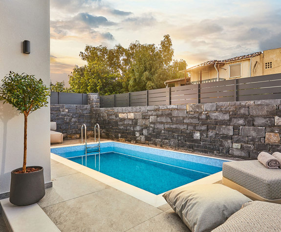 Grey Stones Villa Ammoudara room pool with sunbeds and decorations