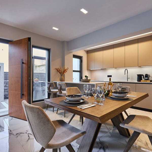 Grey Stones Villa Ammoudara room kitchen with decorated table and chairs